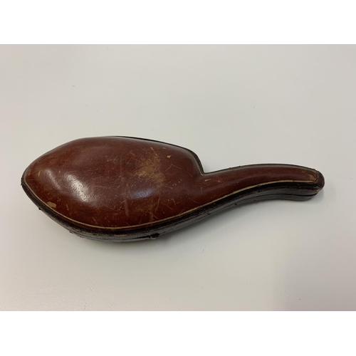 304 - A hand carved late 19th century Bone Pipe with a horse racing theme in custom leather case, 16cm len... 