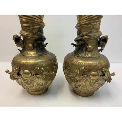 522 - Pair of early Chinese Dragon Vases, 25cm tall and 3.6kg (2)