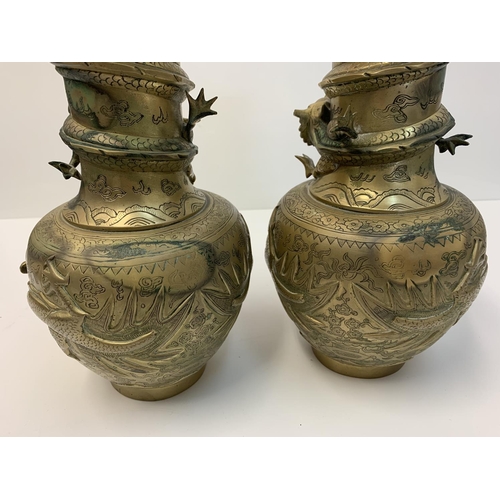 522 - Pair of early Chinese Dragon Vases, 25cm tall and 3.6kg (2)