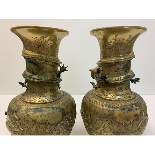 522 - Pair of early Chinese Dragon Vases, 25cm tall and 3.6kg (2)