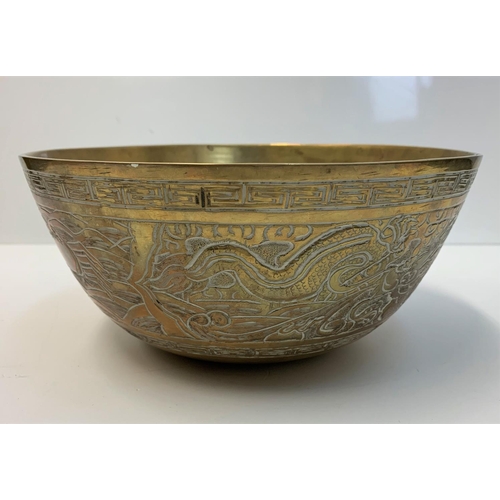 523 - Antique Chinese Brass Bowl with hand chased etchings, 1.95kg and 24cm diameter approx