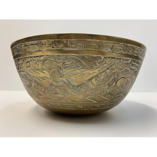 523 - Antique Chinese Brass Bowl with hand chased etchings, 1.95kg and 24cm diameter approx