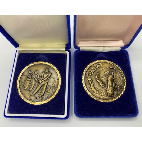 524 - 2x 1980's Golf Awards, 6cm diameter in velvet presentation boxes (2)