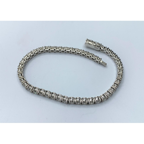 484 - 14ct White gold Tennis Bracelet with 8.6ct diamonds inset, weight 12.2g and 18cm long