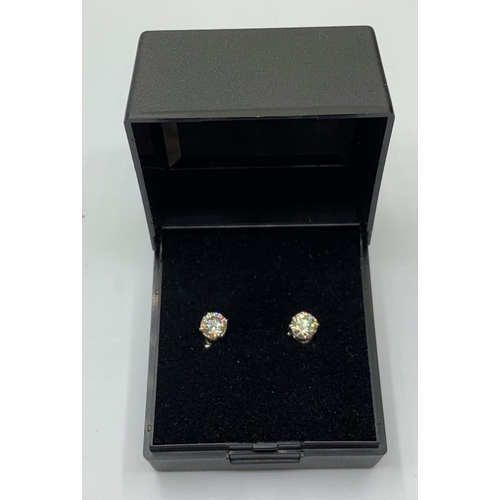 486 - Pair of 18 ct Diamond Stud Earrings with over 1 carat of diamonds set in white gold.