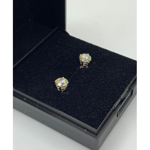 486 - Pair of 18 ct Diamond Stud Earrings with over 1 carat of diamonds set in white gold.