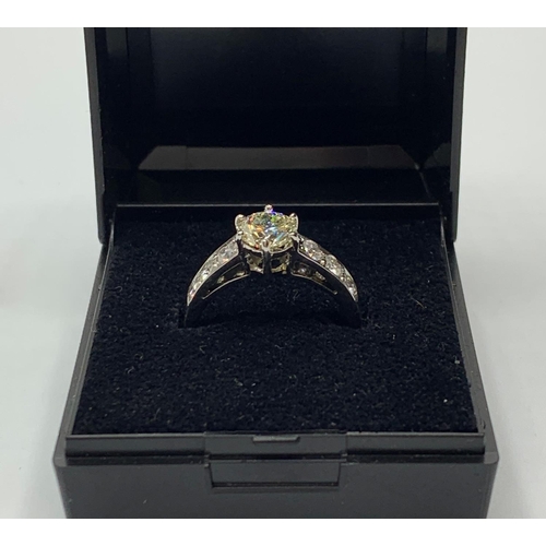 494 - 1.01ct diamond set in 14ct gold with 0.50ct diamond shoulders, weight 4.3g and size M