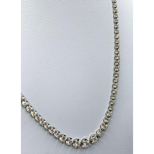 506 - 18ct white gold necklace with 10ct of graduated stones, weight 16.73g and 42cm long