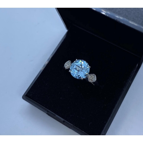 497 - Silver Stone Set Ring with Aquamarine to Centre and Having Four Small Diamonds to Each Shoulder. 925... 