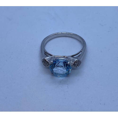 497 - Silver Stone Set Ring with Aquamarine to Centre and Having Four Small Diamonds to Each Shoulder. 925... 