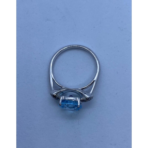 497 - Silver Stone Set Ring with Aquamarine to Centre and Having Four Small Diamonds to Each Shoulder. 925... 