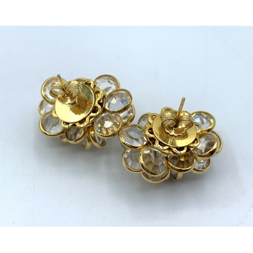 556 - A Pair Of 18ct Gold and Crystal Cluster Earrings in elegant shape, weight 13.5g.