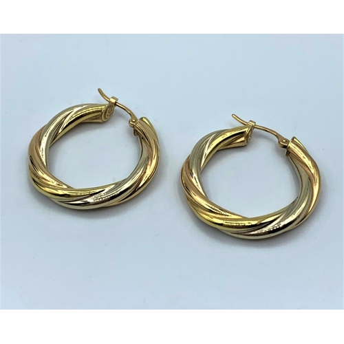 562 - Pair of 18ct Twist Hoop Earrings, weight 2.4g