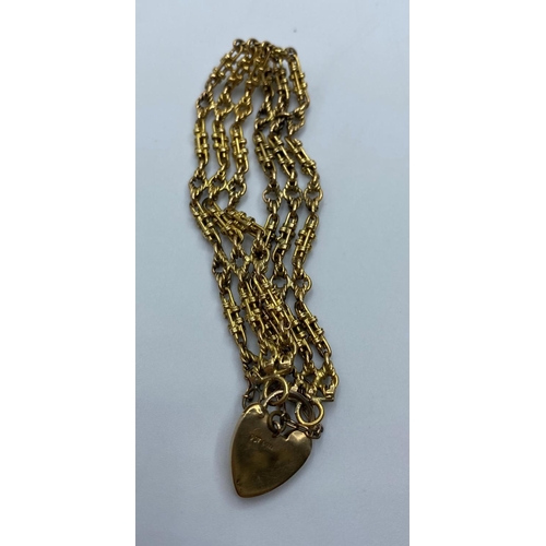 558 - 9ct Gold Watch Chain transformed into a Bracelet with Heart padlock, weight 28.7g and 16cm long appr... 