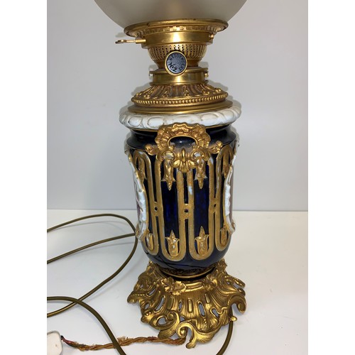 619 - Vintage Brass and Ceramic Oil Lamp 'Messenger's No. 2 
 converted to electricity  62x18cm approx.