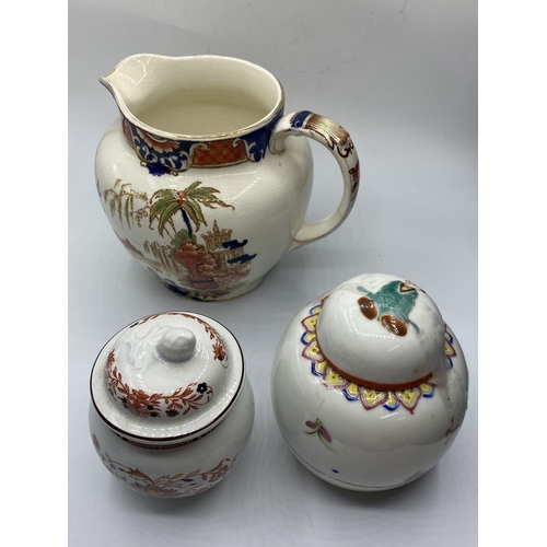 572 - An Oriental themed Jug and Lidded pot with a Wedgwood lidded pot (3)