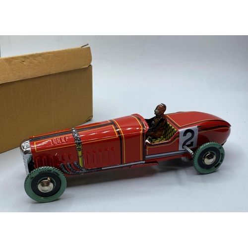 597 - Clockwork Tin Racing car with key