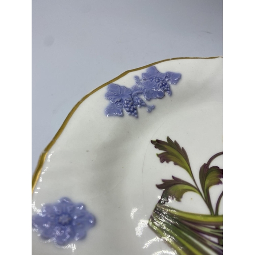 599 - Davenport plate with floral centre and raised blue grape outer design, some rub on gilt work