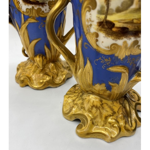 620 - Pair of Daniel blue and gold gilded vases, 17.5cm tall,some mottling to paint finish.A/F.