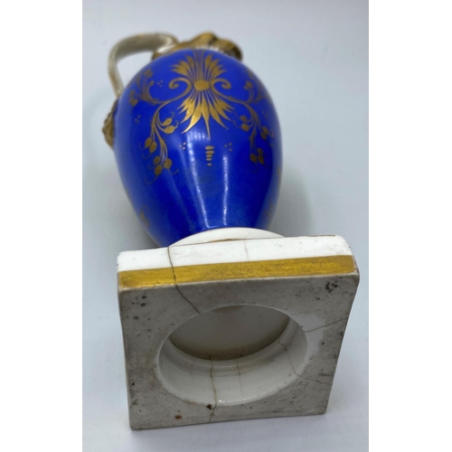 650 - Daniel Grecian style urn 18cm tall with repair to handle and cracks in base