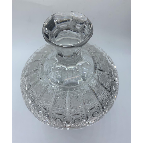 179 - A crystal bowl with lid, 23cms tall and weighs 1.75 kilos