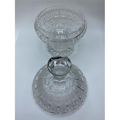 179 - A crystal bowl with lid, 23cms tall and weighs 1.75 kilos