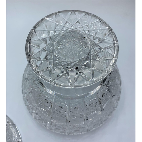 179 - A crystal bowl with lid, 23cms tall and weighs 1.75 kilos