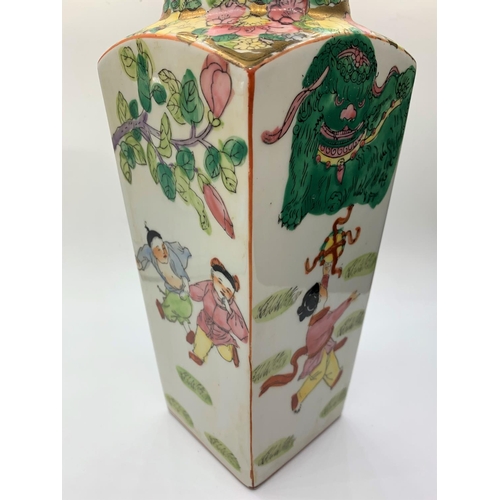 181 - Classical shaped Chinese vase with playing children. 32cm high