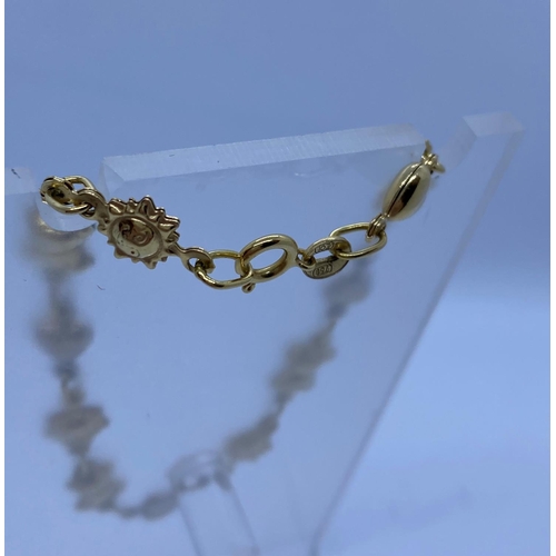 184 - 18ct Gold Childs Teddy Bear and Heart Bracelet. 4.3g, 16cms.