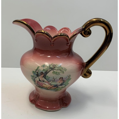 191 - A Staffordshire water jug and matching washing bowl, nicely decorated pink/coral colour.