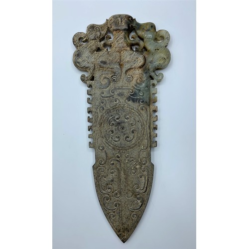 75 - An Antique Chinese Ceremonial Jade Dagger (Jade Ge) Extensive Secondary Mineralisation in Indicative... 