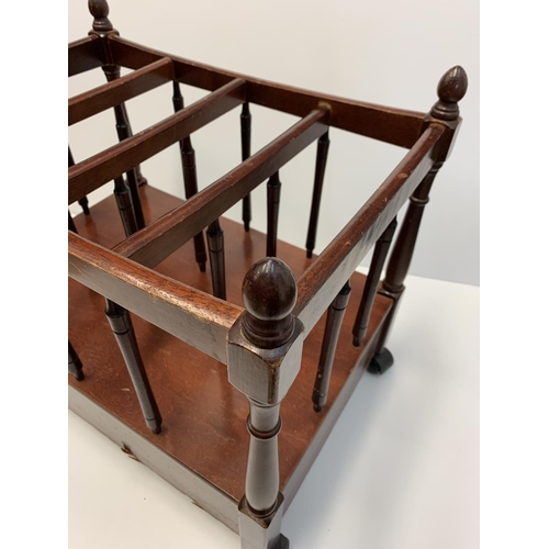 269 - Edwardian wooden magazine rack on castors, 48x33cms