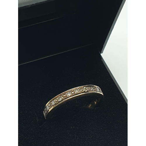 381 - 9CT Gold Half Eternity Ring having 9 Diamonds and gold beadwork to top, size N weight 3g approx