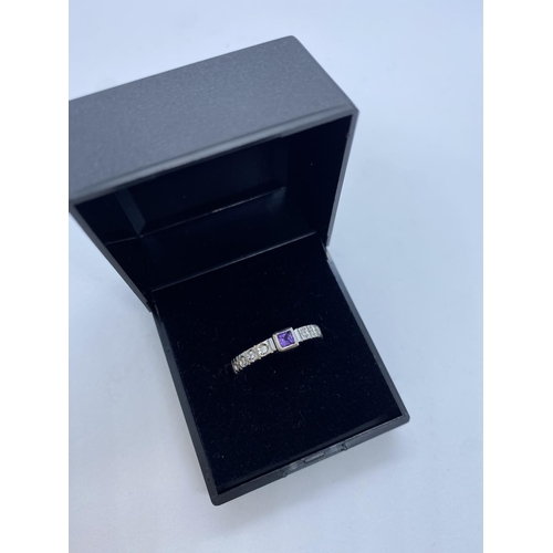 399 - Amethyst  and Diamond 14ct gold Ring, weight 4.2g and size N