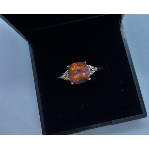 469 - 9ct Gold Ring with rare Orange Topaz Centre stone,Square Cushion Cut. Having Smaller Clear Stones to... 