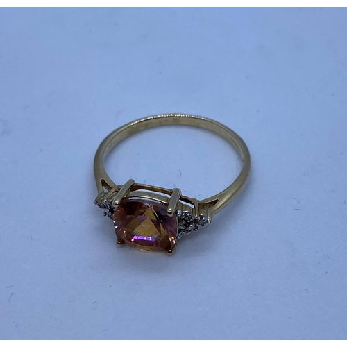 469 - 9ct Gold Ring with rare Orange Topaz Centre stone,Square Cushion Cut. Having Smaller Clear Stones to... 