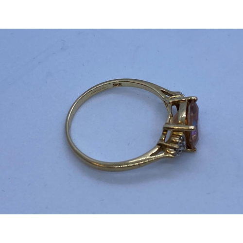 469 - 9ct Gold Ring with rare Orange Topaz Centre stone,Square Cushion Cut. Having Smaller Clear Stones to... 