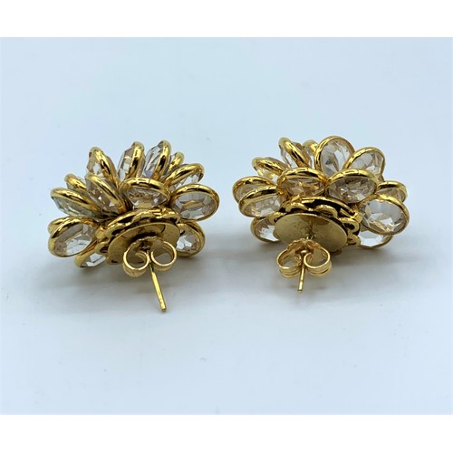 556 - A Pair Of 18ct Gold and Crystal Cluster Earrings in elegant shape, weight 13.5g.