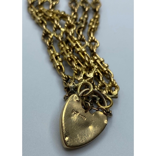 558 - 9ct Gold Watch Chain transformed into a Bracelet with Heart padlock, weight 28.7g and 16cm long appr... 