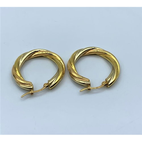 562 - Pair of 18ct Twist Hoop Earrings, weight 2.4g