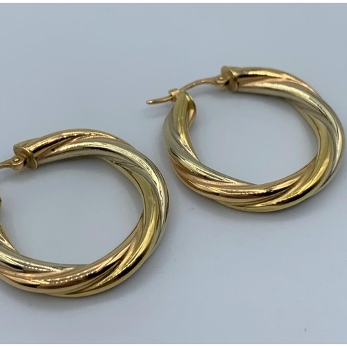 562 - Pair of 18ct Twist Hoop Earrings, weight 2.4g