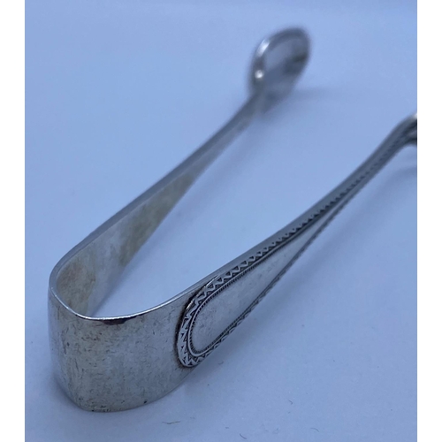 625 - Pair of silver sugar tongs with clear hallmark for John Round & Son Sheffield 1922, weight 25.6g and... 