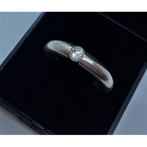 633 - Stone set silver ring consisting a wide and thick silver hoop with single Zirconia to top size N