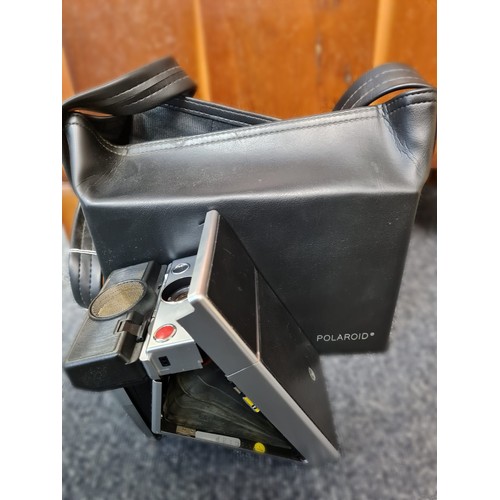 95 - Vintage Polaroid Instant Camera in Carrying Case.