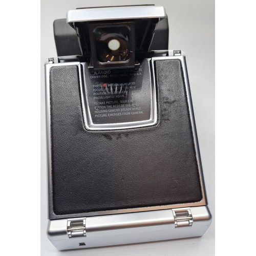 95 - Vintage Polaroid Instant Camera in Carrying Case.