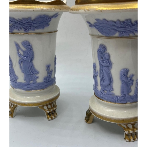 592 - A pair of Davenport 3 footed vases, 13cm tall some age related marks (2)