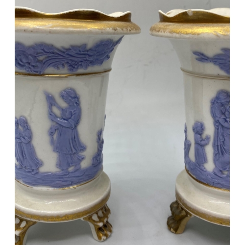 592 - A pair of Davenport 3 footed vases, 13cm tall some age related marks (2)