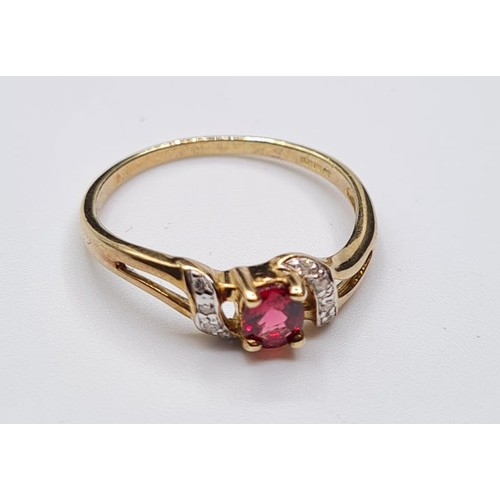 138 - 9ct Gold Stone Set Ring Having a Ruby Centre Stone with Diamonds to the Shoulders, Hallmark Showing ... 