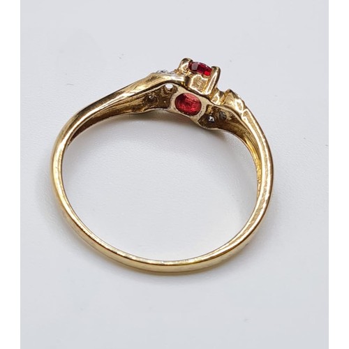 138 - 9ct Gold Stone Set Ring Having a Ruby Centre Stone with Diamonds to the Shoulders, Hallmark Showing ... 