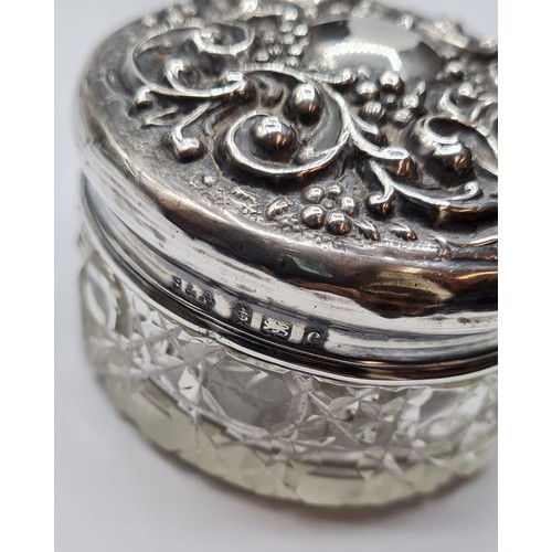 212 - Vintage Dressing Table Silver Topped Jar. Silver Lid Having Floral Scrolled Repousse Work. Clear Hal... 